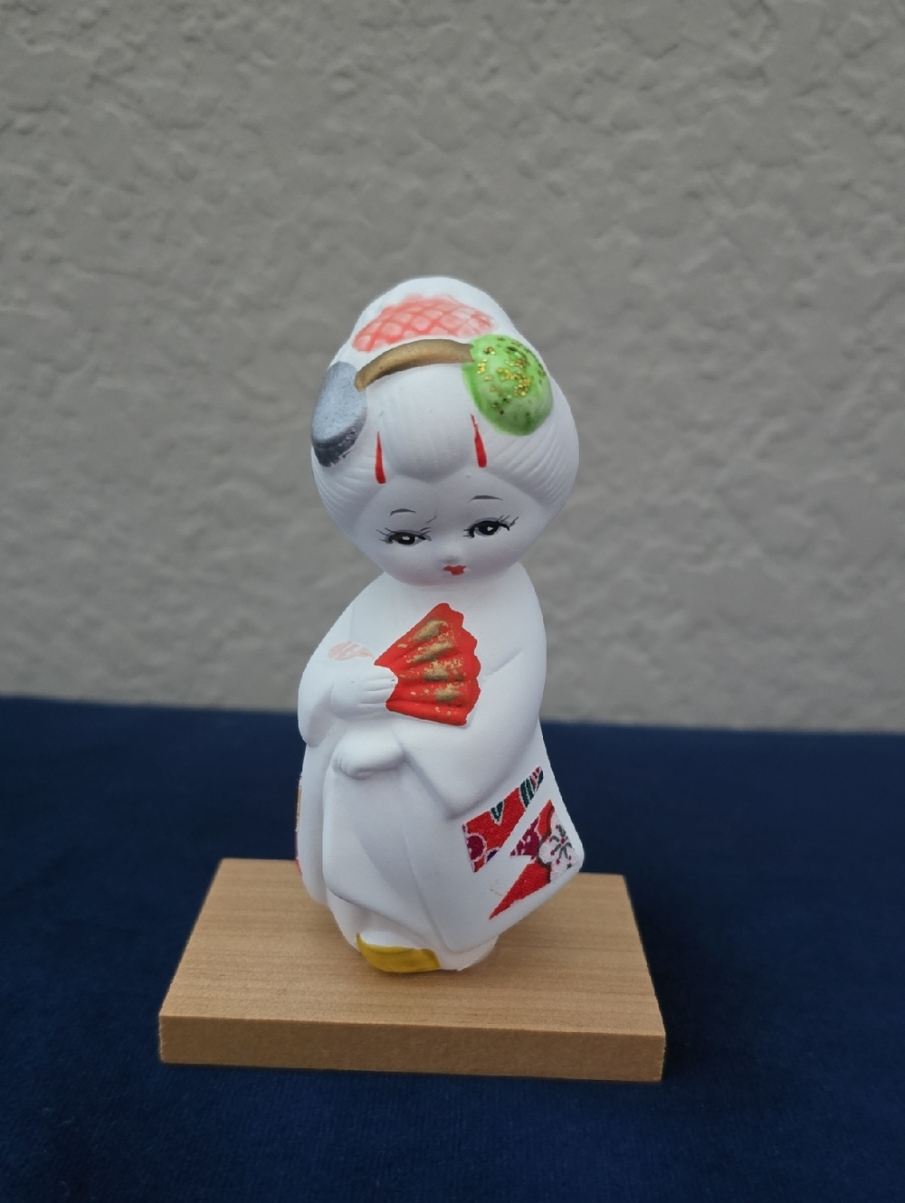 Hand-Painted White Ceramic Geisha Figurine